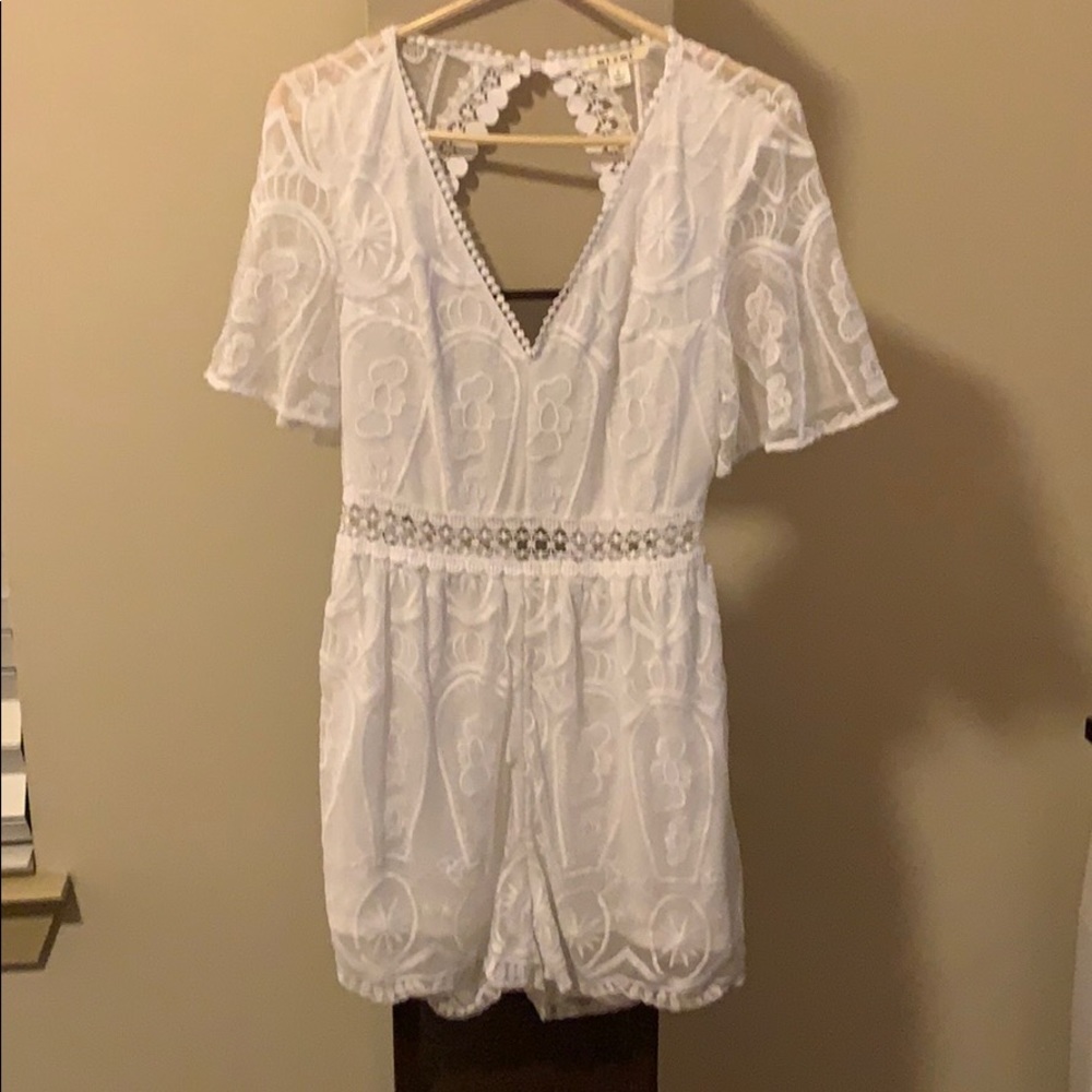 Francesca white romper with open back